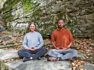 Two people in a Meditation for Inner Peace in the countryside