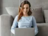 A Woman on a computer logging into the Friday Online Meditation Course